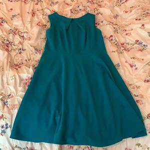 Size 14- turquoise dress that zips in the back.